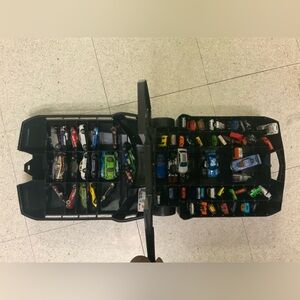 Lots of 73 hot wheels with travel rolling case. Couple of cosmetic scratches.